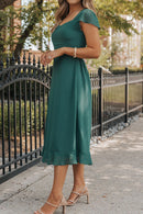 Robe à manches courtes et ourlet à volants