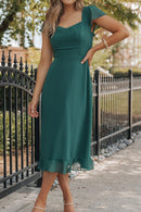 Robe à manches courtes et ourlet à volants