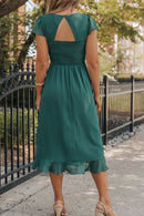 Robe à manches courtes et ourlet à volants