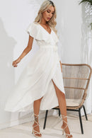 Robe midi nouée à volants et col en V