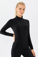 Camiseta deportiva con cremallera de un cuarto y cuello simulado