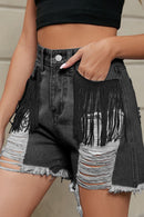Short en denim usé avec franges et poches