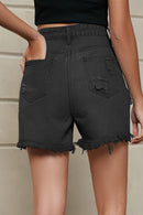 Short en denim usé avec franges et poches