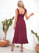 Robe mi-longue à bretelles nouées et encolure carrée