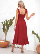 Robe mi-longue à bretelles nouées et encolure carrée