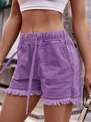 Short en denim à ourlet brut avec cordon de serrage