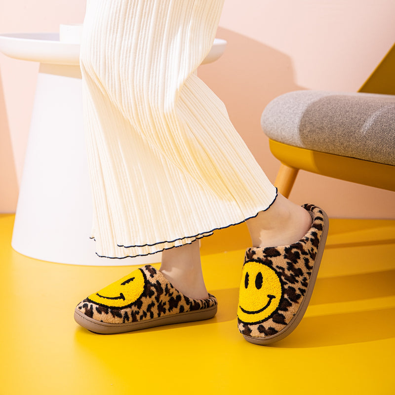 Pantuflas de leopardo con cara sonriente de Melody