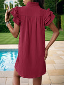 Mini-robe crantée à volants et manches volantées