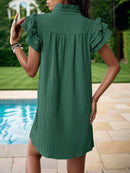 Mini-robe crantée à volants et manches volantées