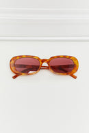 Lunettes de soleil ovales à monture complète