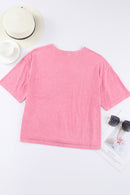 Top con cuello redondo y hombros caídos con bolsillo