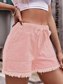 Shorts vaqueros con cordón y dobladillo sin rematar