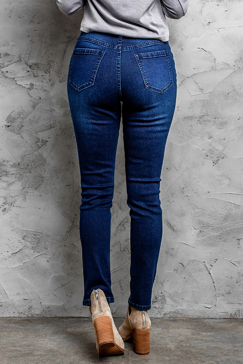 Jeans ajustados desgastados de cintura media