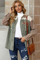 Veste en velours côtelé à capuche avec boutons-pression sur le devant