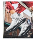 Chaussures unisexes en maille respirante à semelle haute 