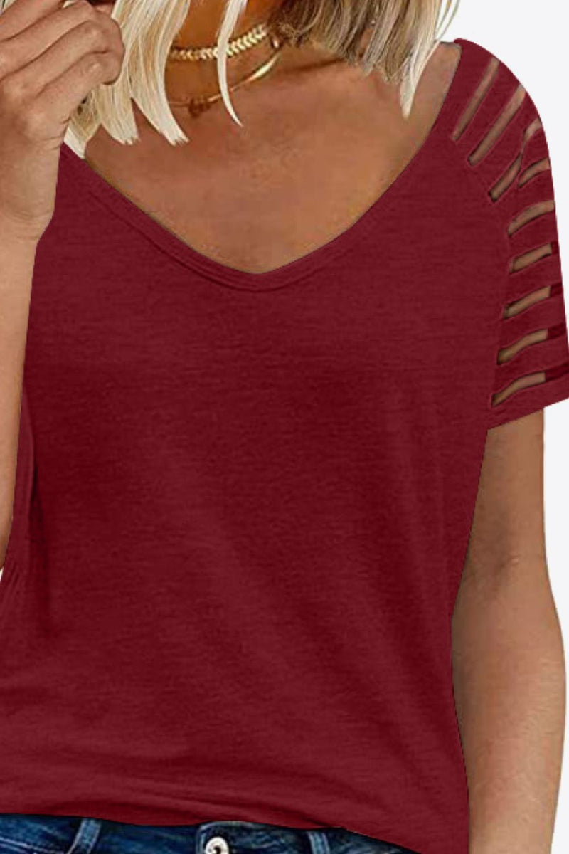 Camiseta con cuello en V y manga raglán