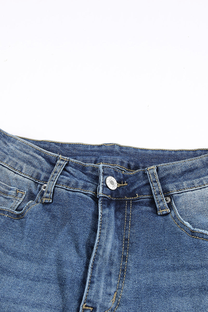 Jeans acampanados de cintura alta con bolsillos