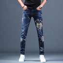 Men's Ripped Stretch Jeans W/ Embroidery Designs - AM APPAREL